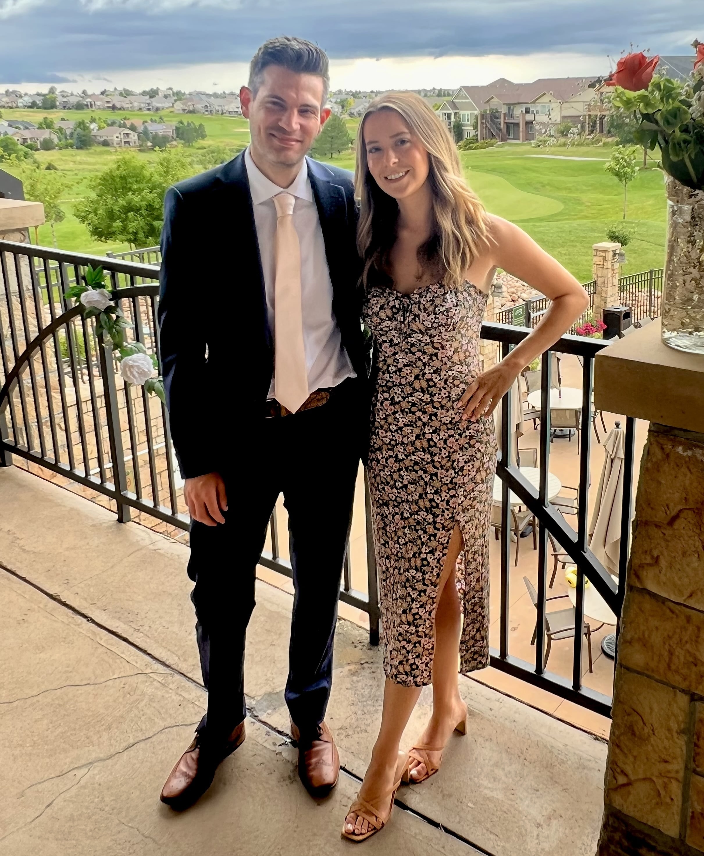 Sean & Melanie posing at golf country club